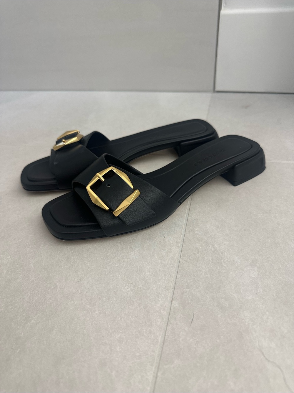 Jimmy Choo Black Slide Mules with Gold Buckle